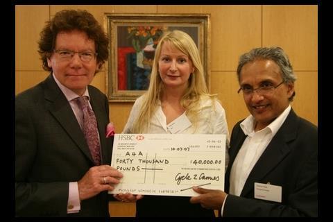 Sunand Prasad presents cheque for £40,000 to Architects for Aid